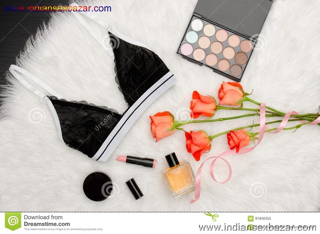 Black Lace Bra White Fur Orange Roses Lipstick Perfume Eye Shadow Fashionable Concept Top View 91846355